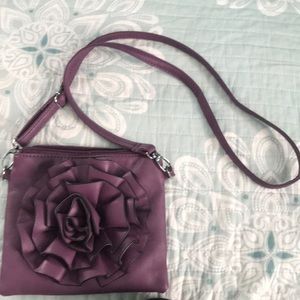 purple “Mellow World” purse with flower